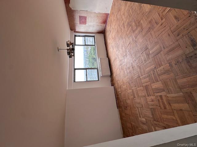 125-10 Queens Boulevard, Unit 2307 Queens, NY 11415 - Photo 20 of 25 a view of empty room with window