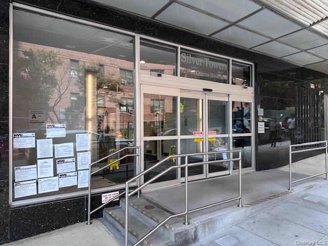 125-10 Queens Boulevard, Unit 2307 Queens, NY 11415 - Photo 2 of 25 a view of a room with racks on the wall