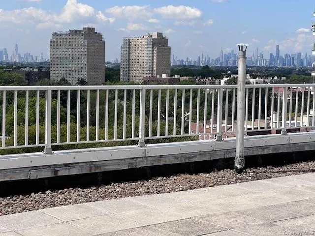 a view of a street with a balcony