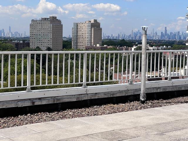 125-10 Queens Boulevard, Unit 2307 Queens, NY 11415 - Photo 23 of 25 a view of a street with a balcony