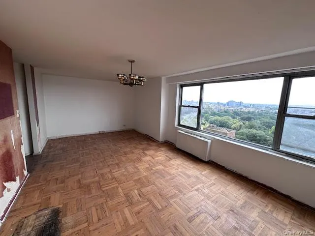 en empty room with windows