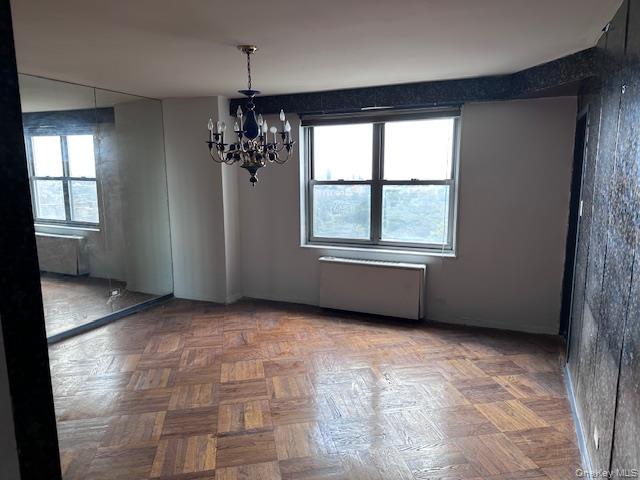 125-10 Queens Boulevard, Unit 2307 Queens, NY 11415 - Photo 7 of 25 a view of an empty room with a window