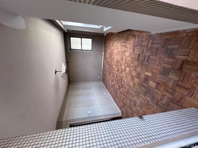 125-10 Queens Boulevard, Unit 2307 Queens, NY 11415 - Photo 8 of 25 en empty room with windows