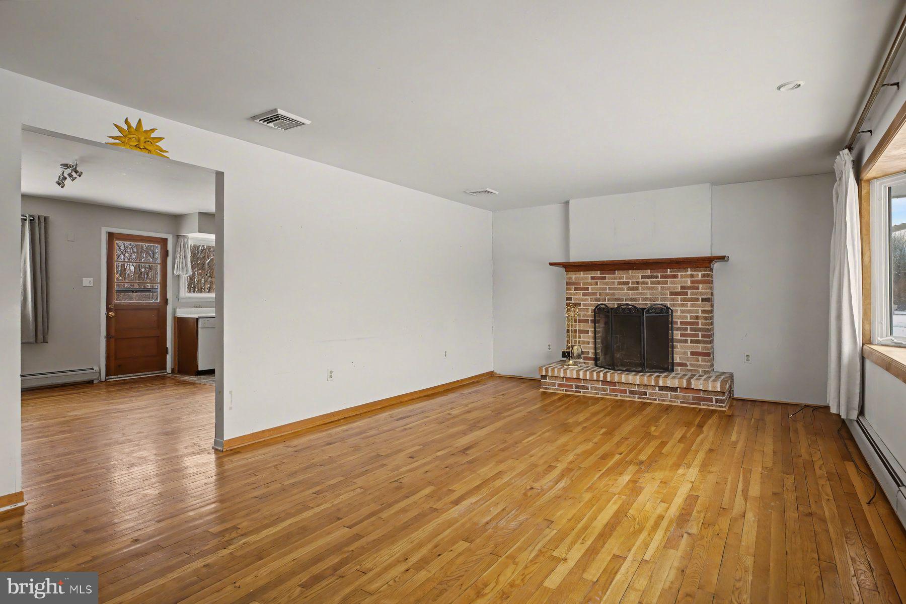 3702 Kings Road Pennsburg, PA 18073 - Photo 11 of 36 Living room looking into kitchen/dining area