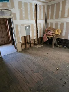 a view of empty room with windows