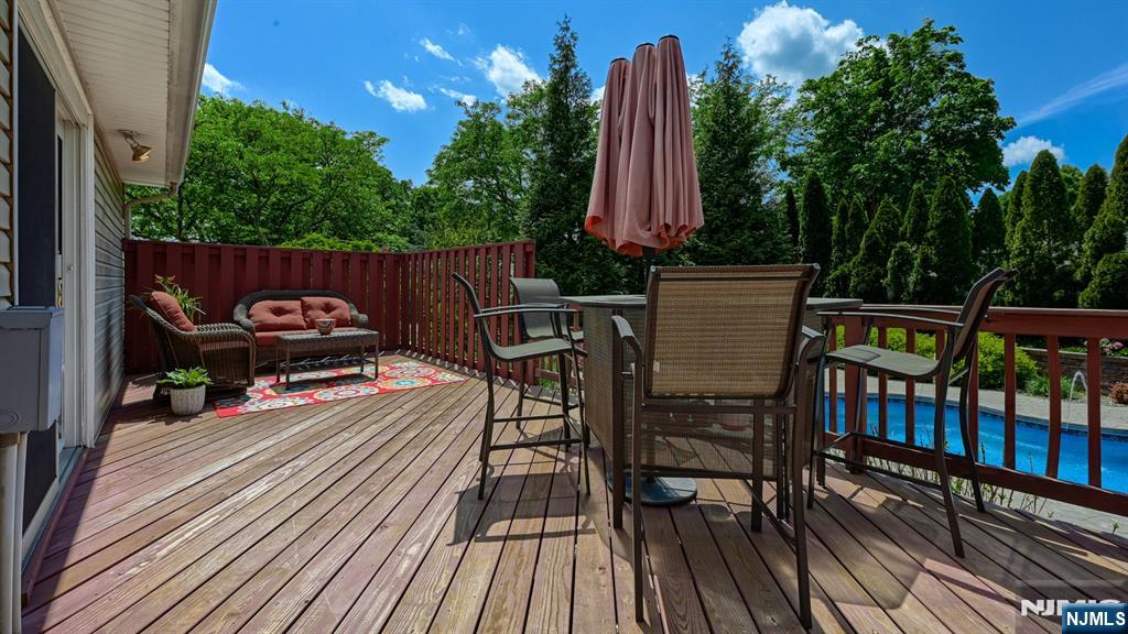 277 French Hill Road Wayne, NJ 07470 - Photo 26 of 28 a view of a chairs and table on the deck