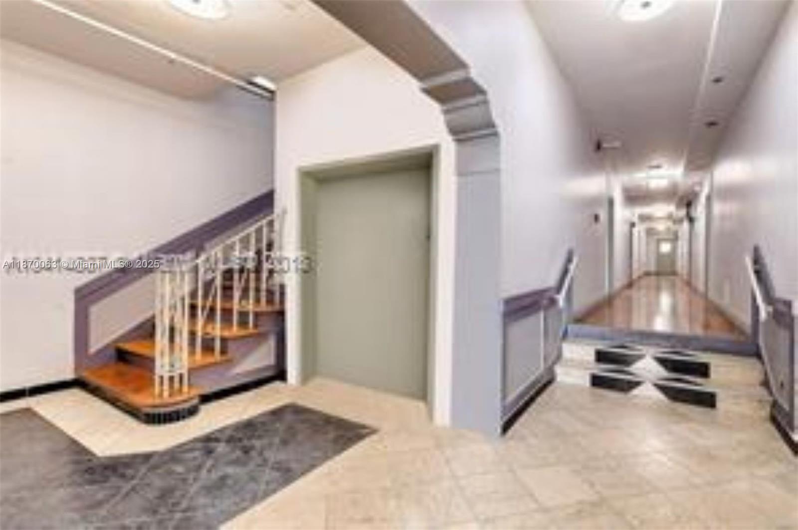 3710 Collins Avenue, Unit N103 Miami Beach, FL 33140 - Photo 42 of 53 a view of a hallway with staircase