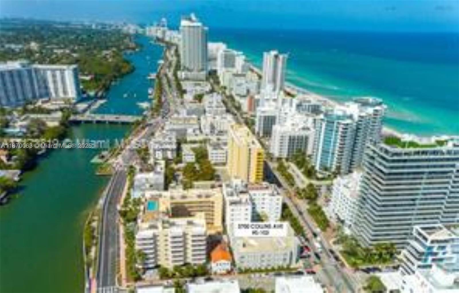 3710 Collins Avenue, Unit N103 Miami Beach, FL 33140 - Photo 10 of 53 a view of building with yard and lake view