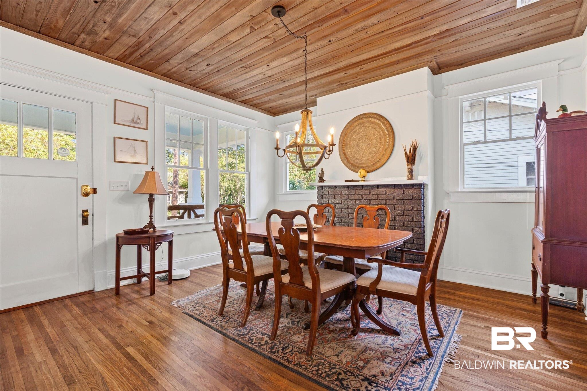 11 South Lafayette Street Mobile, AL 36604 - Photo 6 of 20 Dining area featuring wooden ceiling, a chandelier, and wood finished floors