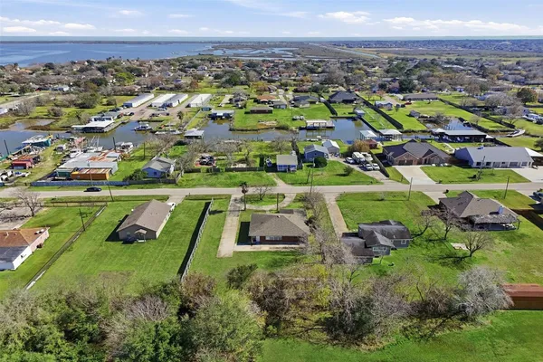 an aerial view of residential house with outdoor space