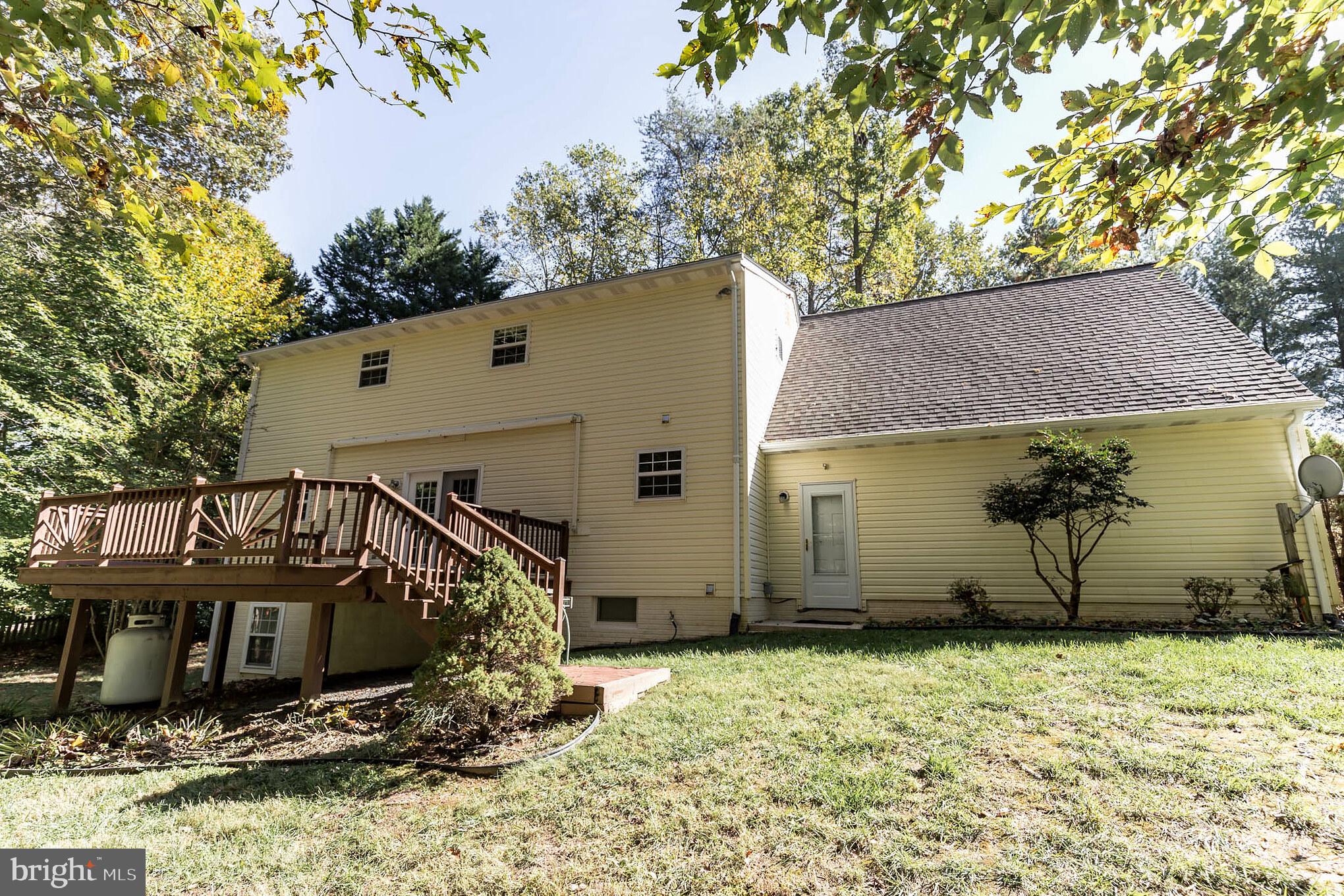 640 Small Reward Road Huntingtown, MD 20639 - Photo 23 of 28 a view of a house with a yard