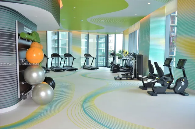 a view of a balcony with wooden floor