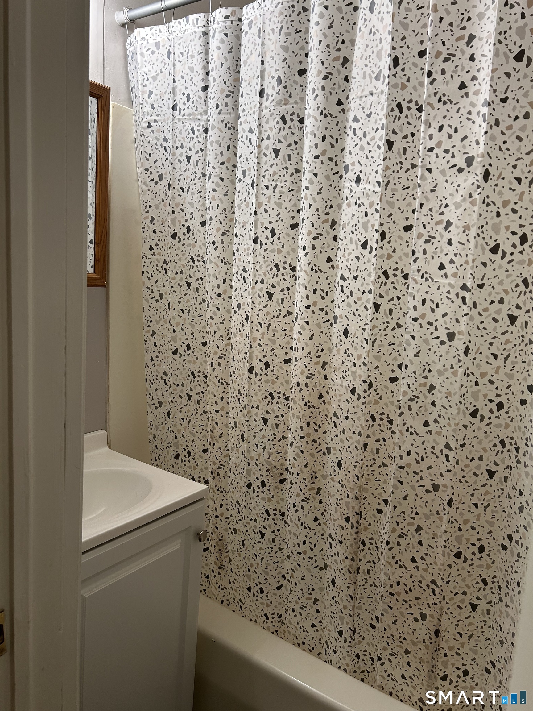 68 Anderson Street Naugatuck, CT 06770 - Photo 6 of 7 a bathroom with a shower curtain