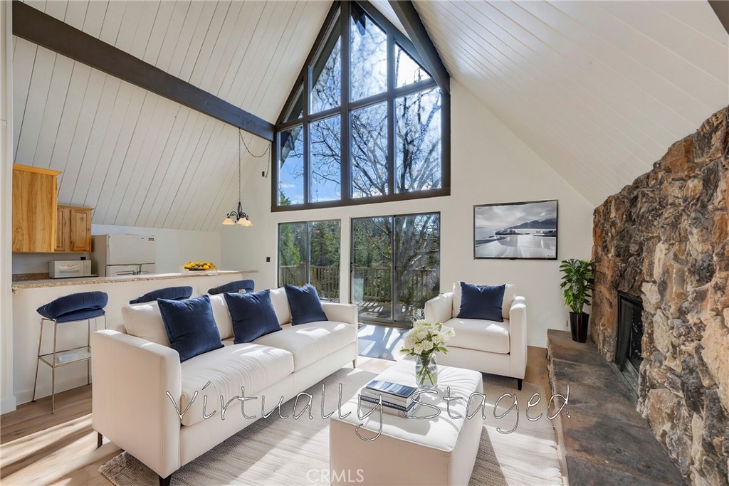 743 Rhine Road Lake Arrowhead, CA 92352 - Photo 6 of 30 a living room with furniture and a large window