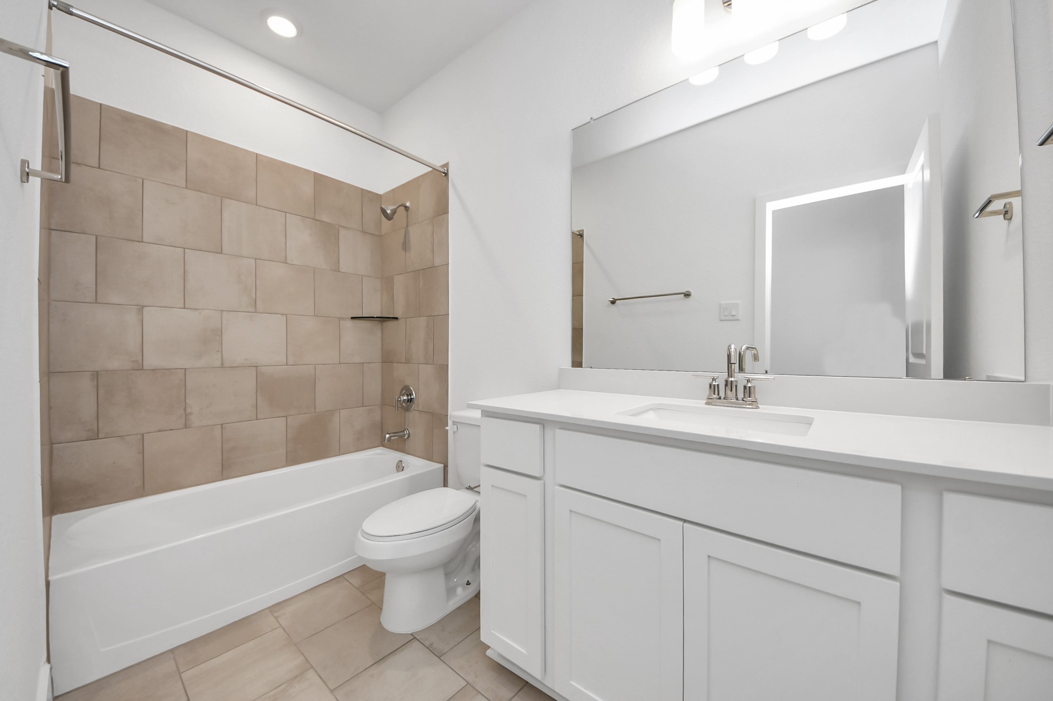 14471 Trumpet Lane Splendora, TX 77372 - Photo 18 of 33 a bathroom with a sink a toilet and shower