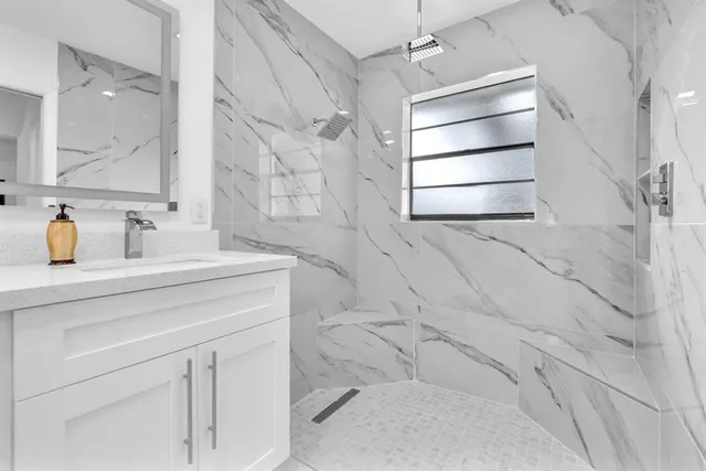 a bathroom with a sink and a bathtub