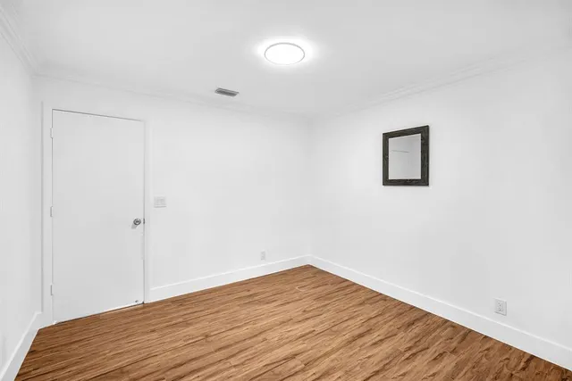 a house that is sitting in the grass