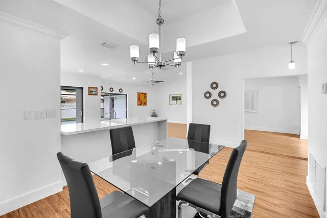 a view of a livingroom with wooden floor
