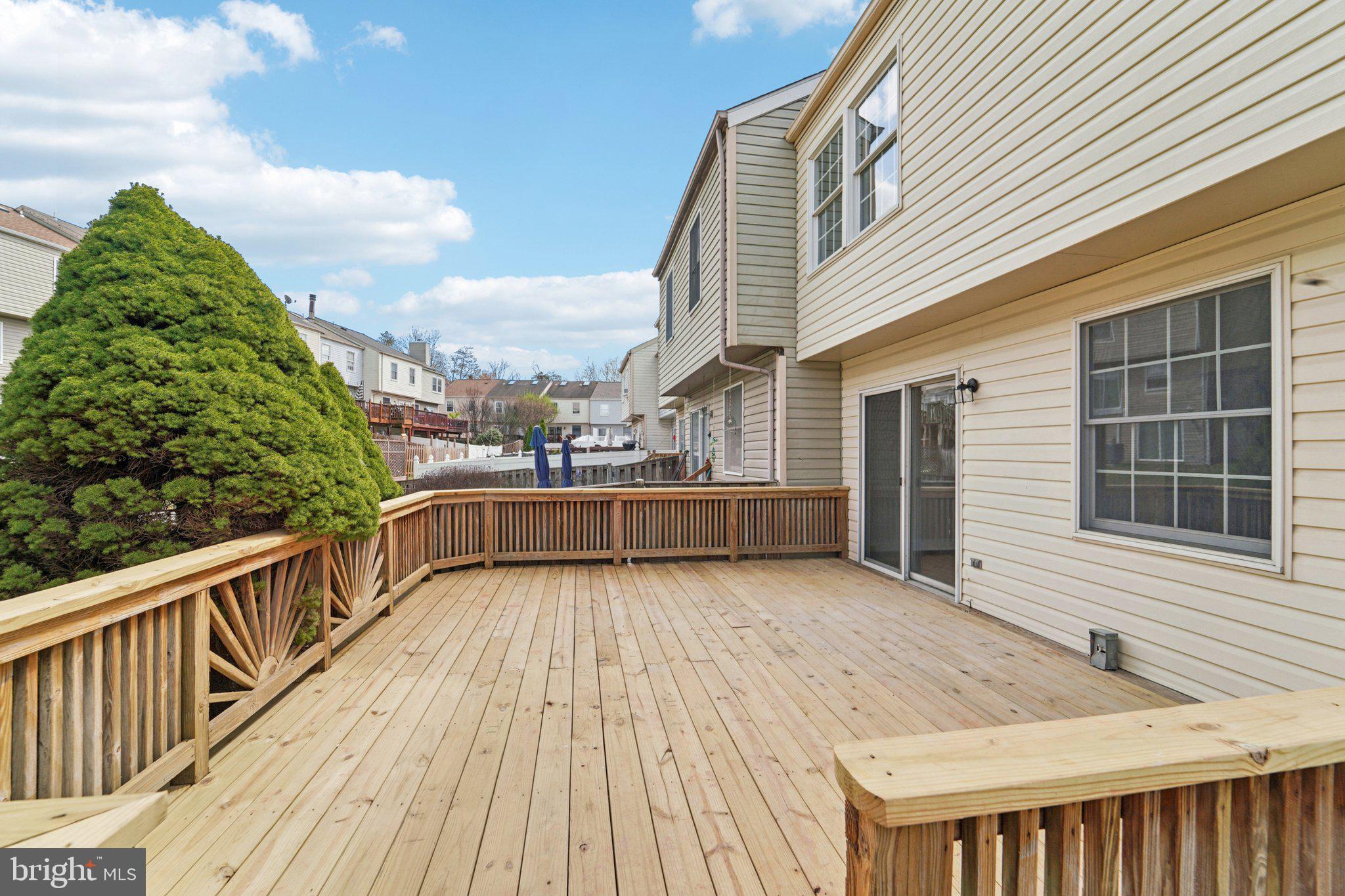 8727 Silver Hall Road Perry Hall, MD 21128 - Photo 27 of 35 a view of a balcony with wooden floor and fence