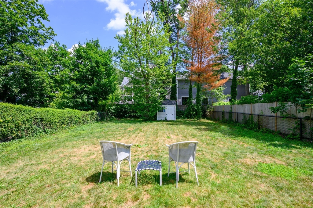 40 Lyman Road Milton, MA 02186 - Photo 21 of 28 a view of a chair and table in the yard