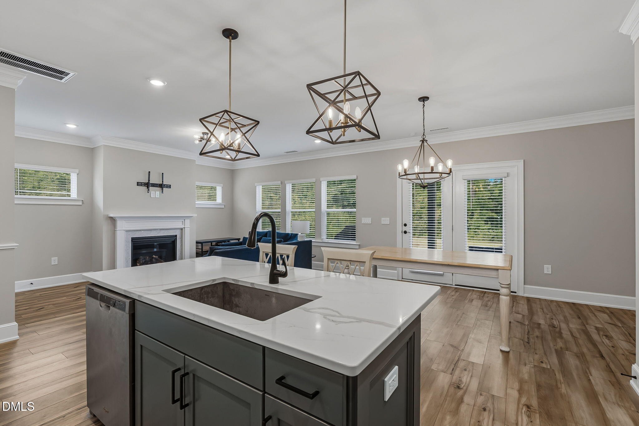 438 Diversity Way Raleigh, NC 27610 - Photo 14 of 33 a very nice looking kitchen with a chandelier
