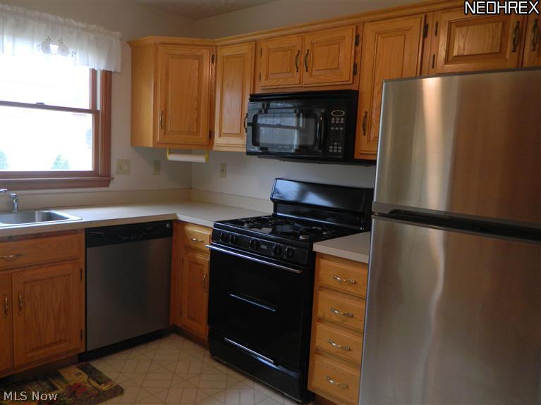 6781 Neff Road Medina, OH 44256 - Photo 12 of 15 In-law suite's kitchen.
