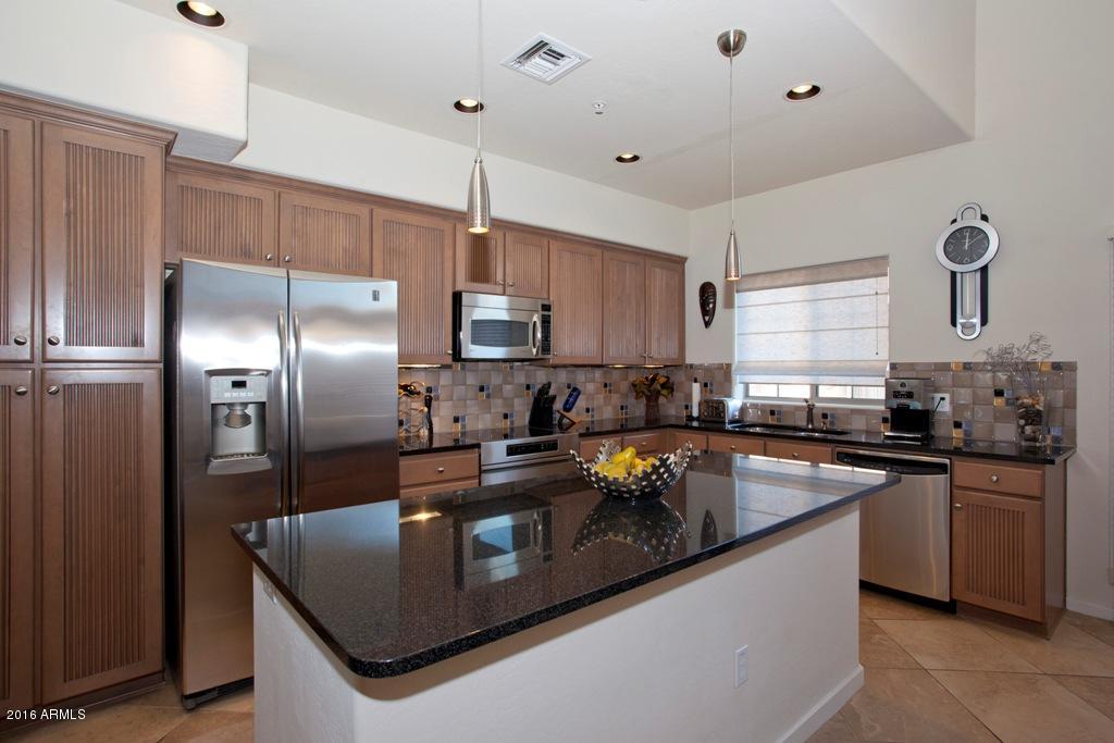 3935 East Rough Rider Road, Unit 1202 Phoenix, AZ 85050 - Photo 11 of 22 Kitchen 1