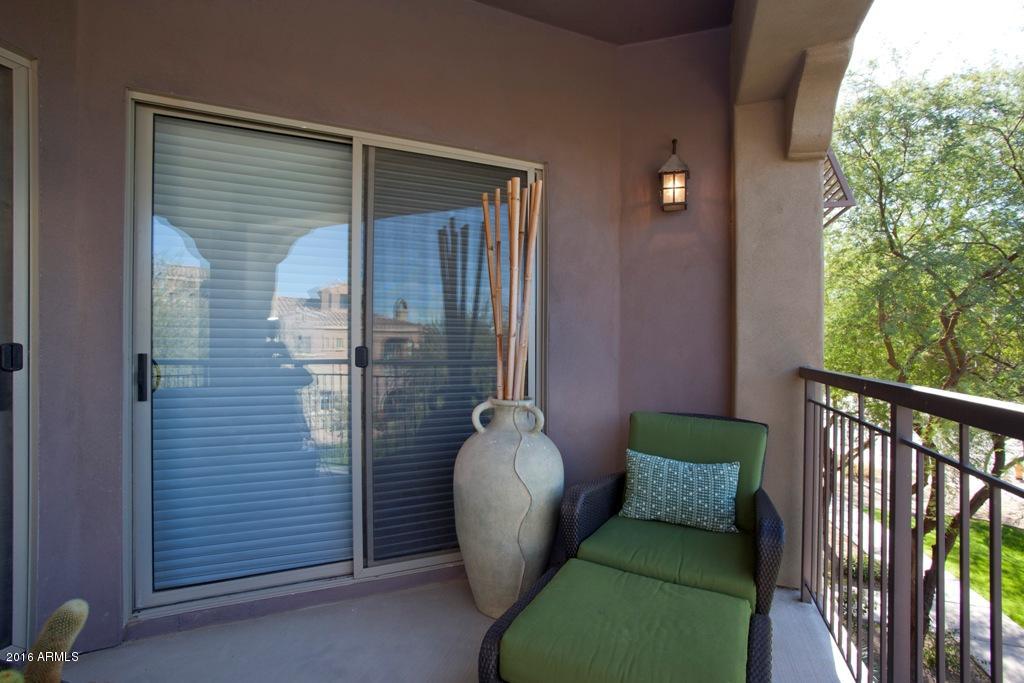 3935 East Rough Rider Road, Unit 1202 Phoenix, AZ 85050 - Photo 20 of 22 patio to living slider door