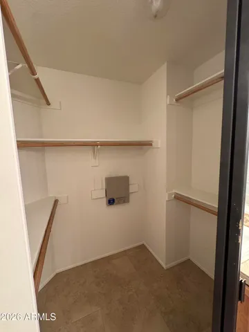 a large bathroom with a double vanity sink and a mirror
