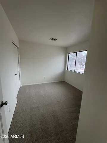 a bathroom with a toilet and a bathtub