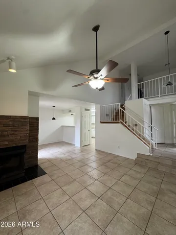 a view of a hallway with windows
