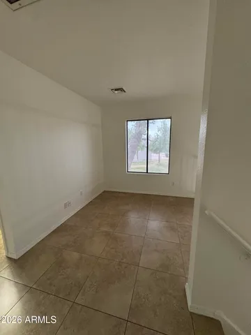 a bathroom with a bathtub and a toilet