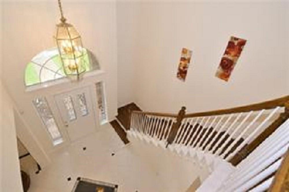 5828 Mossbrook Trail Dallas, TX 75252 - Photo 2 of 25 a view of staircase with white walls