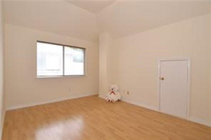 5828 Mossbrook Trail Dallas, TX 75252 - Photo 21 of 25 an empty room with a window