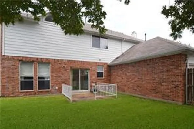 swimming pool view with a sitting space