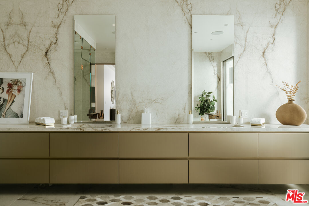2180 Stradella Road Los Angeles, CA 90077 - Photo 12 of 21 a bathroom with a sink and mirror