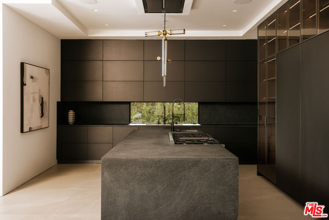 2180 Stradella Road Los Angeles, CA 90077 - Photo 4 of 21 a kitchen with a refrigerator and a stove