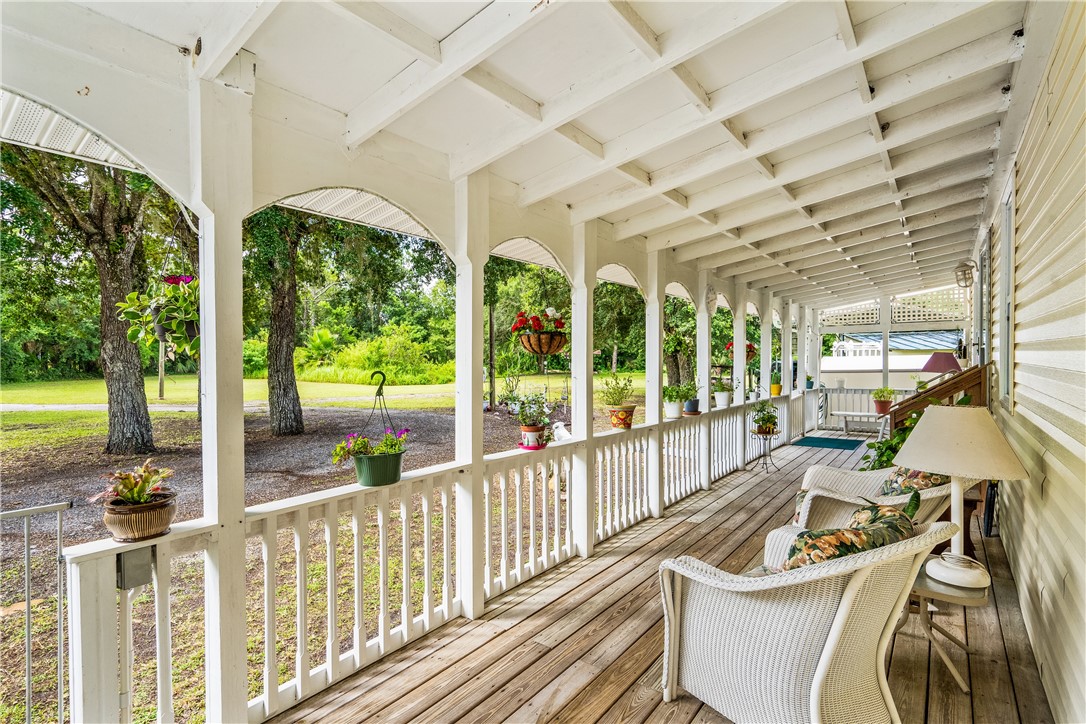 5660 Cypress Drive Yeehaw Junction, FL 34972 - Photo 1 of 36 a very nice looking room with a large window