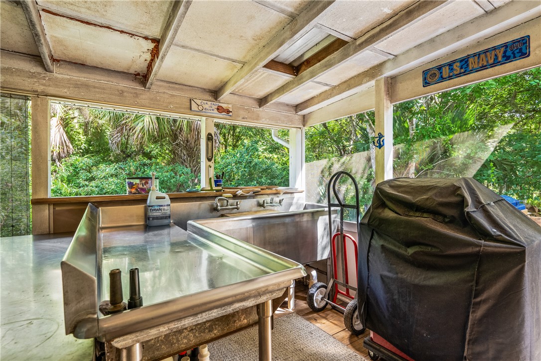 5660 Cypress Drive Yeehaw Junction, FL 34972 - Photo 26 of 36 a view of swimming pool with a patio