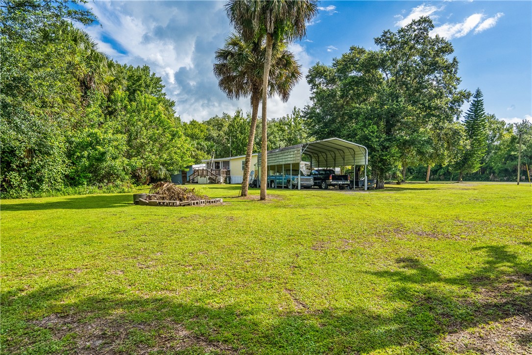 5660 Cypress Drive Yeehaw Junction, FL 34972 - Photo 32 of 36 a view of an ocean view