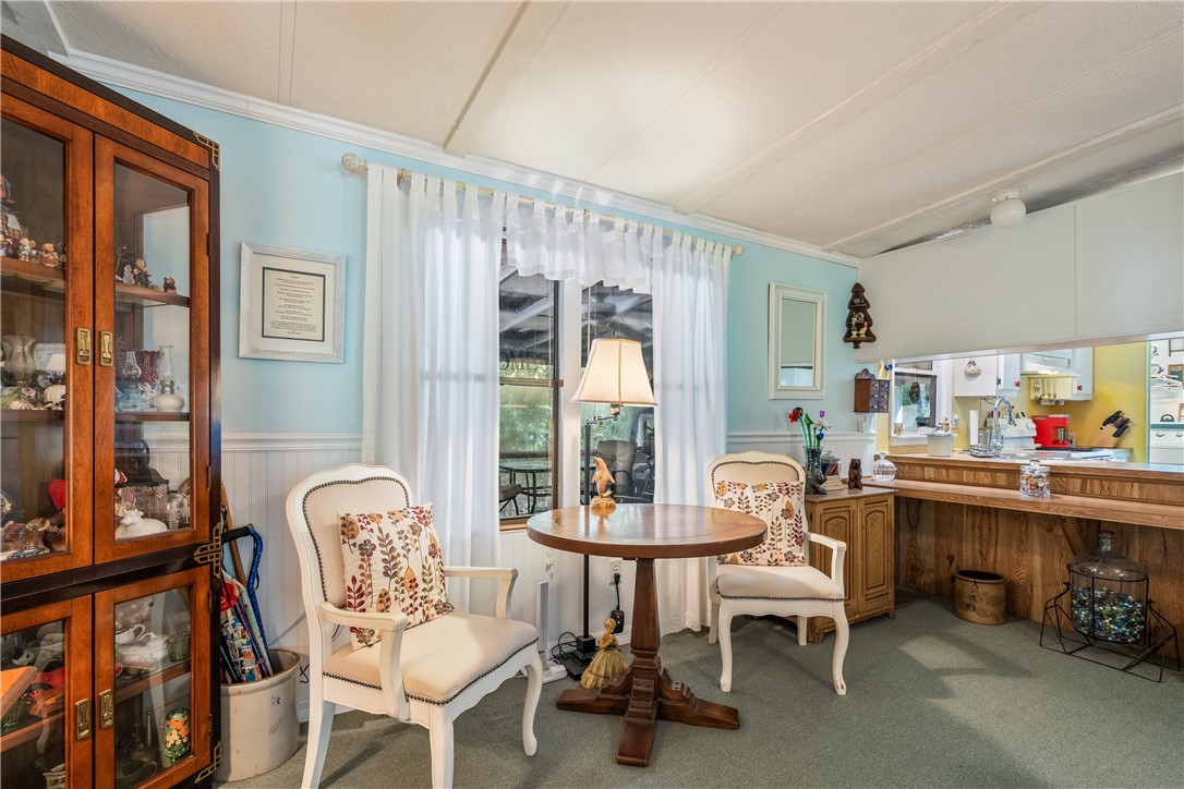 5660 Cypress Drive Yeehaw Junction, FL 34972 - Photo 8 of 36 a living room with furniture and a window