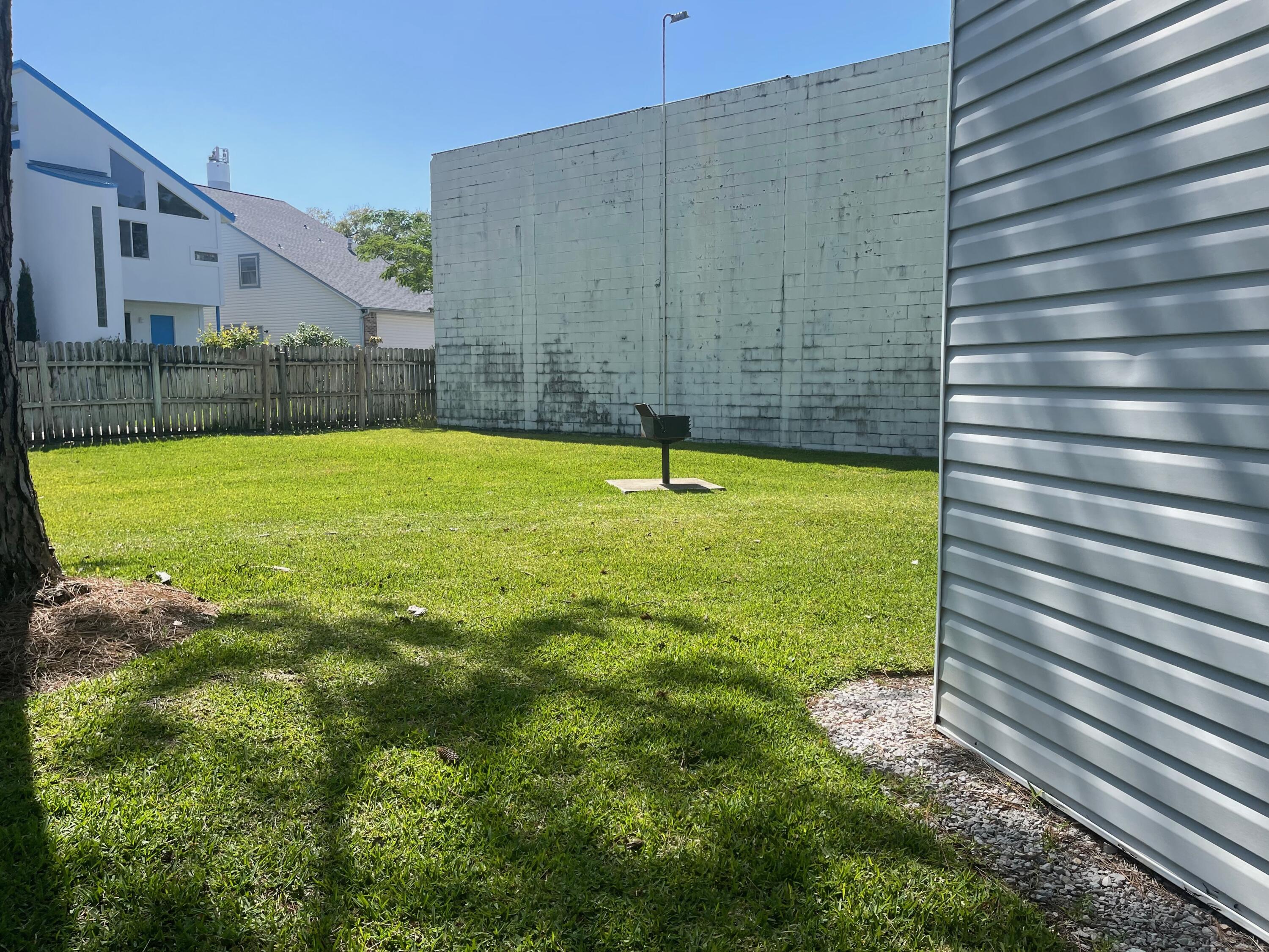 101 Old Ferry Road, Unit 8A Shalimar, FL 32579 - Photo 15 of 22 a view of a backyard