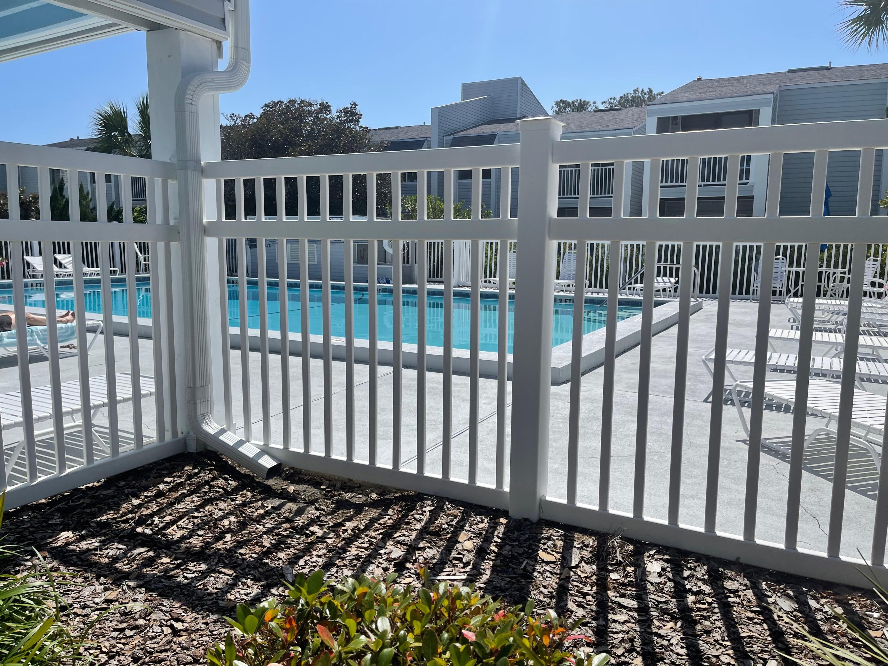 101 Old Ferry Road, Unit 8A Shalimar, FL 32579 - Photo 18 of 22 a front view of a house with a bench