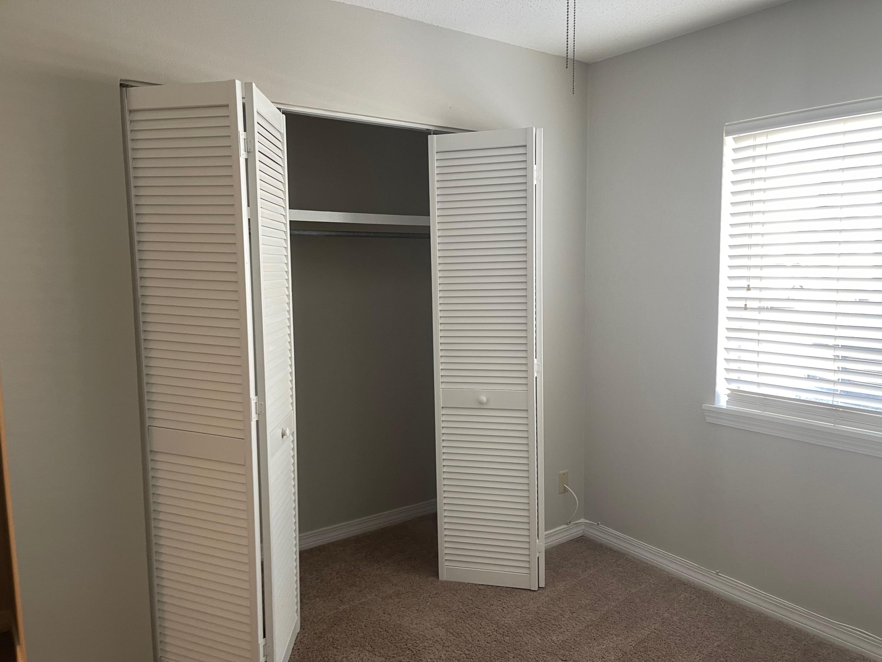 101 Old Ferry Road, Unit 8A Shalimar, FL 32579 - Photo 22 of 22 a view of closet area with window