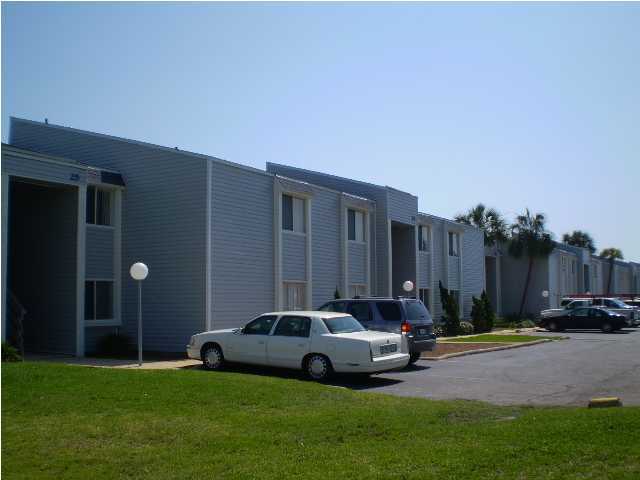 101 Old Ferry Road, Unit 8A Shalimar, FL 32579 - Photo 3 of 22 a car parked in front of a house