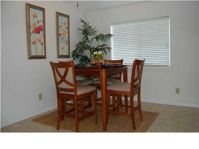 101 Old Ferry Road, Unit 8A Shalimar, FL 32579 - Photo 5 of 22 a dining room with furniture and window