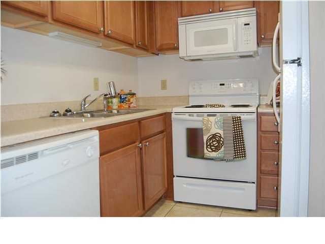 101 Old Ferry Road, Unit 8A Shalimar, FL 32579 - Photo 7 of 22 a utility room with a sink washer and dryer
