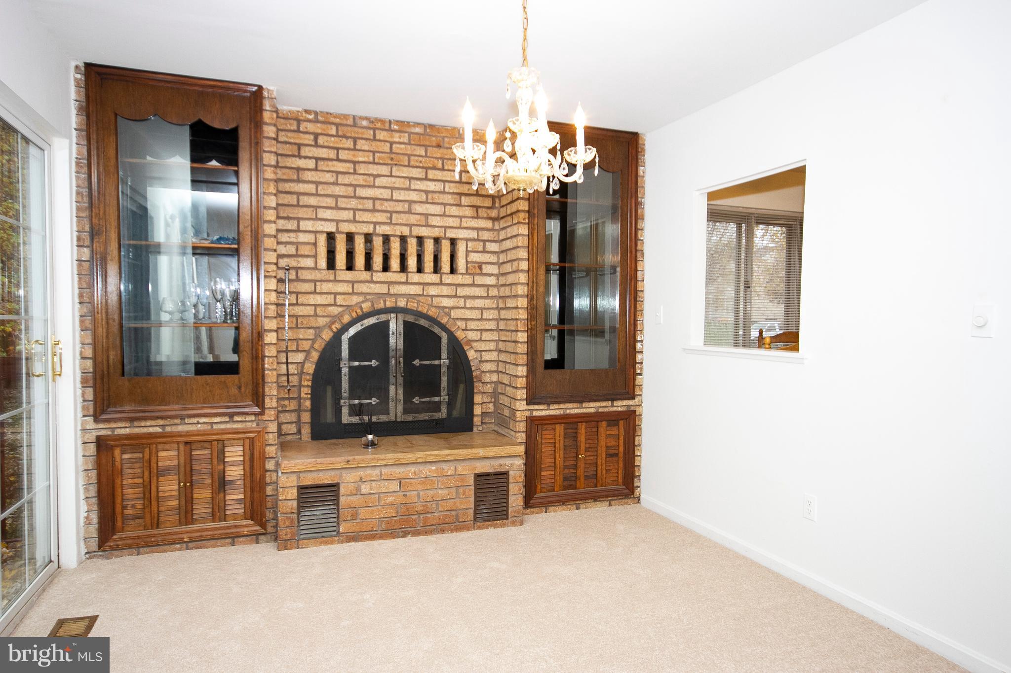 4213 Haycoke Road Baltimore, MD 21236 - Photo 11 of 30 DINING AREA WITH GORGEOUS FIREPLACE FOR AMBIANCE