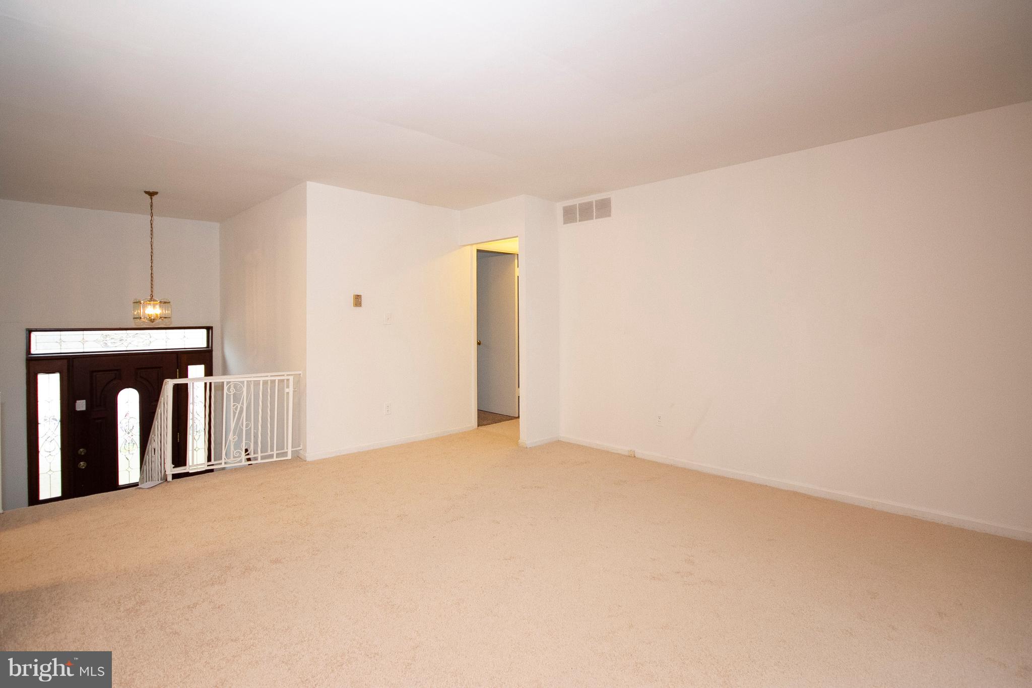 4213 Haycoke Road Baltimore, MD 21236 - Photo 12 of 30 FORMAL LIVING ROOM WITH OPEN VIEW OF FOYER