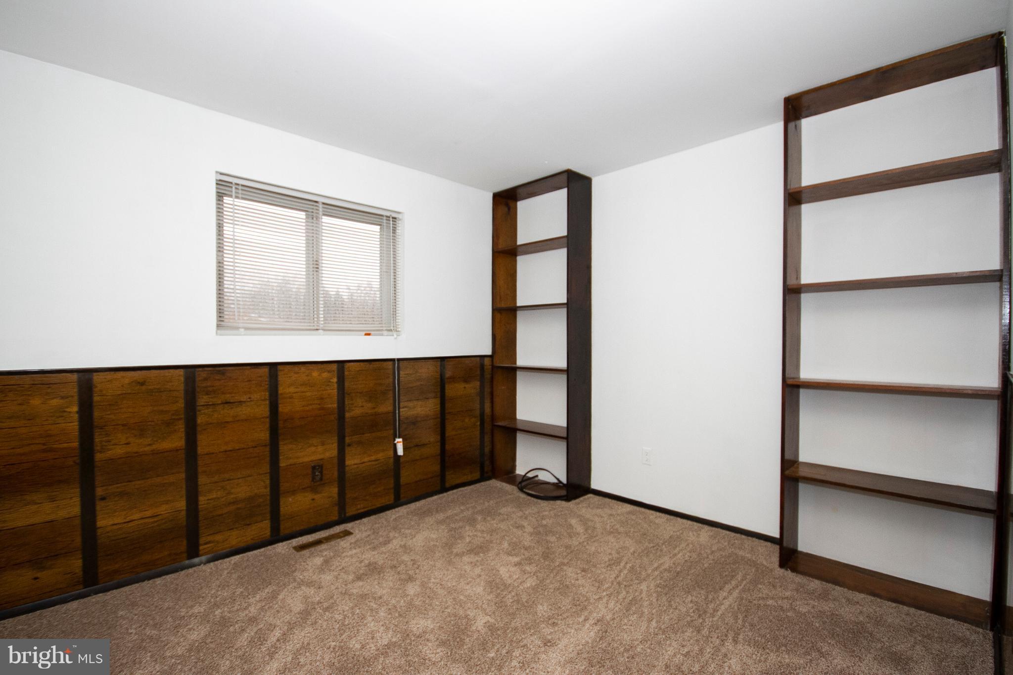 4213 Haycoke Road Baltimore, MD 21236 - Photo 14 of 30 2ND BEDROOM BUILT IN BOOKCASES NEW CARPET